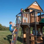 Backyard Discovery Canyon Creek Wooden Swing Set with Slide and Rock Wall - Image 3